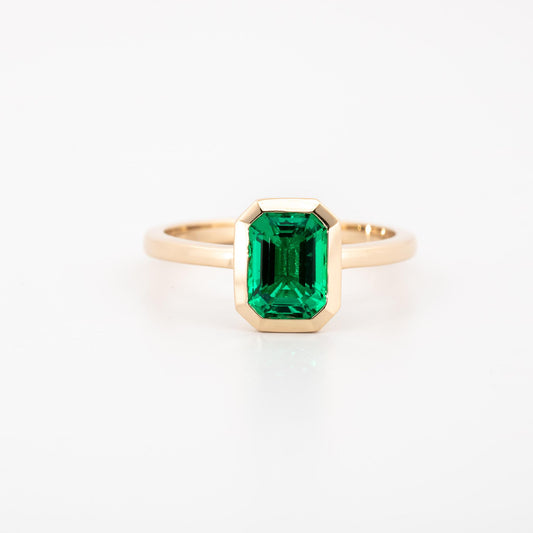 14K Yellow gold bezel set lab grown emerald cut emerald, 1.15 ct